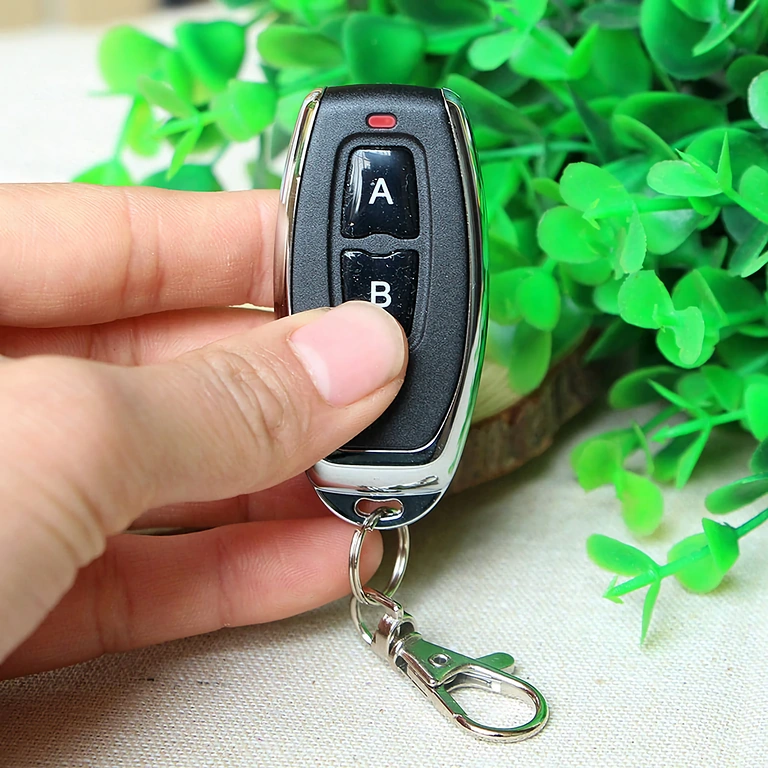 Modello compatto 2 pulsanti, frequenza 433MHz, codice apprendimento 1527