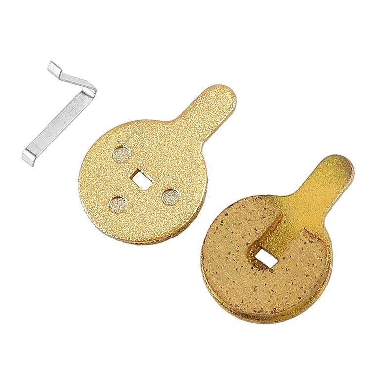 Dettaglio pastiglie freno metalliche, materiale rame